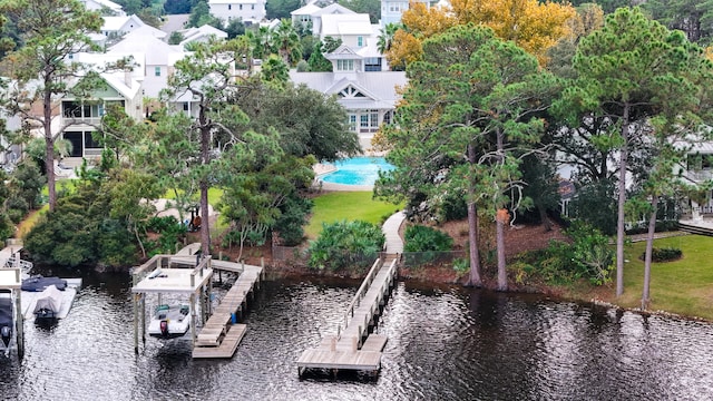 bird's eye view with a water view