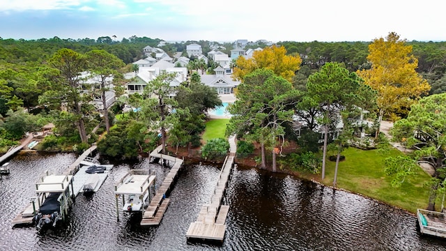 birds eye view of property featuring a water view