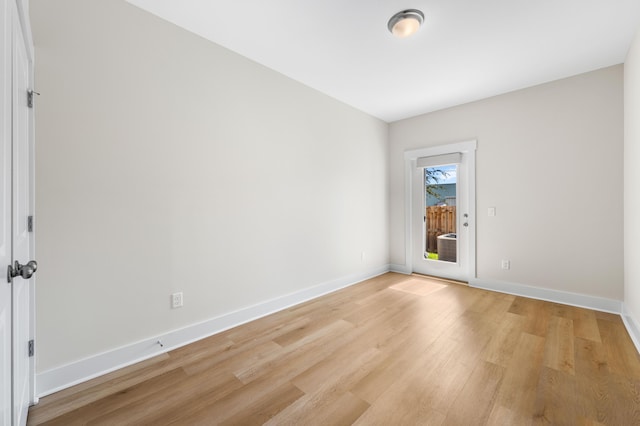 empty room with light wood-type flooring