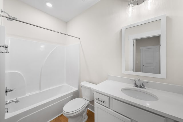 full bathroom with shower / washtub combination, vanity, and toilet