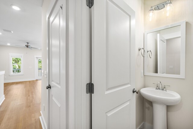 22958 Ann Miller Rd, Panama City Beach, FL 32413 - bathroom featuring wood finished floors, ceiling fan, and recessed lighting