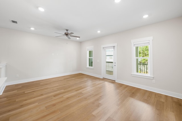 22958 Ann Miller Rd, Panama City Beach, FL 32413 - unfurnished living room featuring recessed lighting, light wood finished floors, and ceiling fan