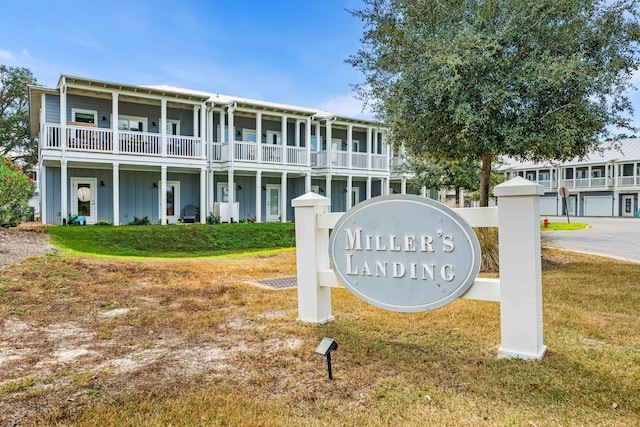 22958 Ann Miller Rd, Panama City Beach, FL 32413 - community / neighborhood sign featuring a lawn