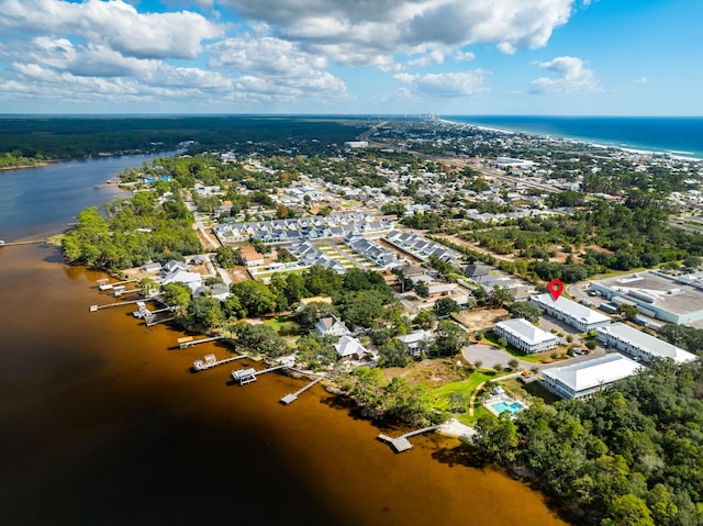 bird's eye view with a water view