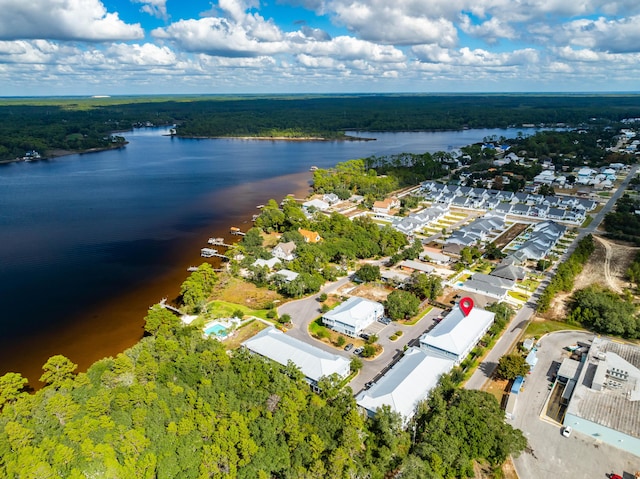 drone / aerial view with a water view