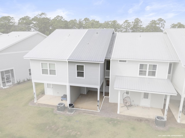 rear view of property featuring a patio area