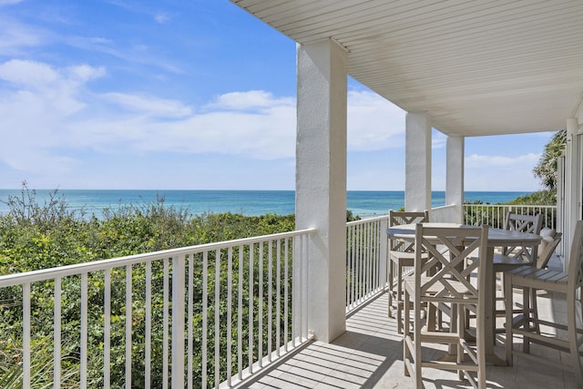 balcony featuring a water view