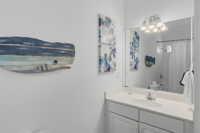 full bathroom with toilet, shower / bath combo, vanity, and an inviting chandelier