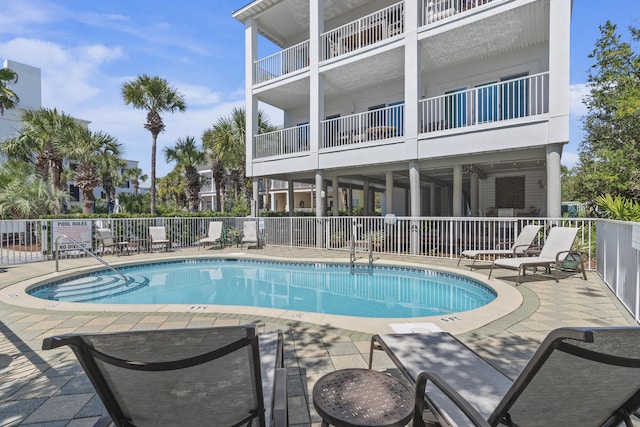 view of pool featuring a patio