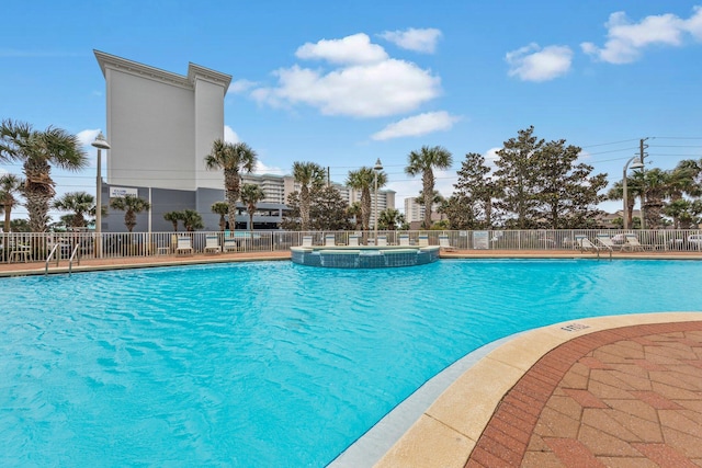 view of pool featuring a community hot tub