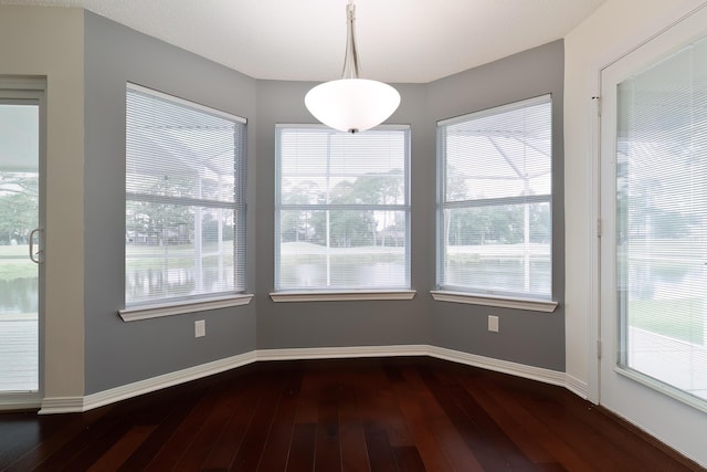 946 Shalimar Point Dr, Shalimar, FL 32579 - unfurnished dining area featuring dark wood finished floors and baseboards