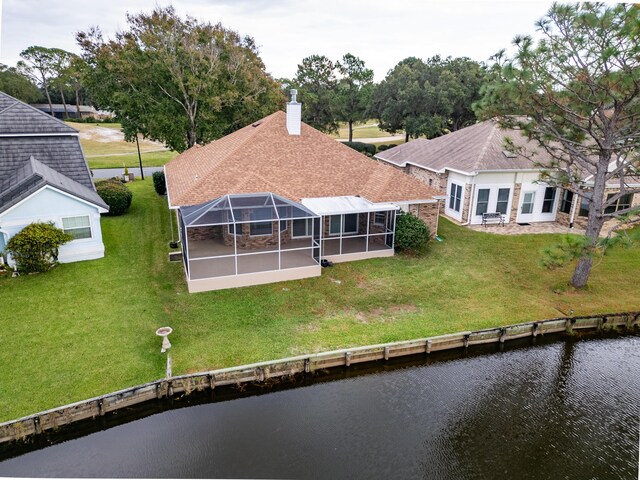 946 Shalimar Point Dr, Shalimar, FL 32579 - back of property with a water view, a yard, a chimney, a patio, and a lanai