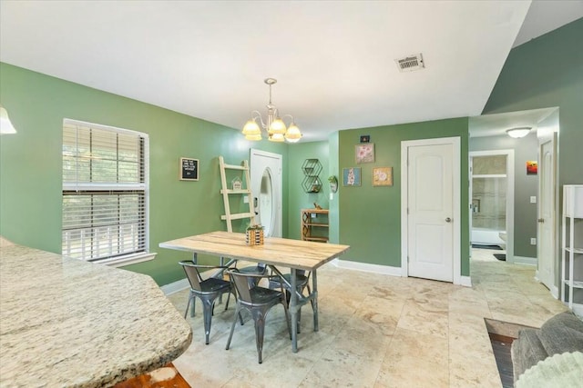 dining room featuring an inviting chandelier