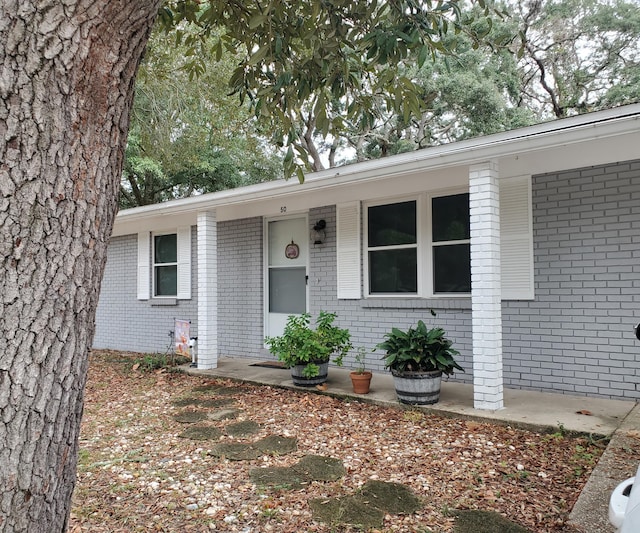50 Junior Dr, Shalimar, FL 32579 - ranch-style home with brick siding