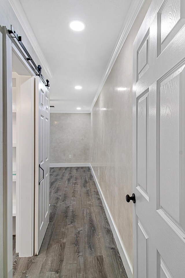 402 Marshall Ct Unit 01, Fort Walton Beach, FL 32548 - corridor featuring a barn door, crown molding, dark wood-style floors, baseboards, and recessed lighting