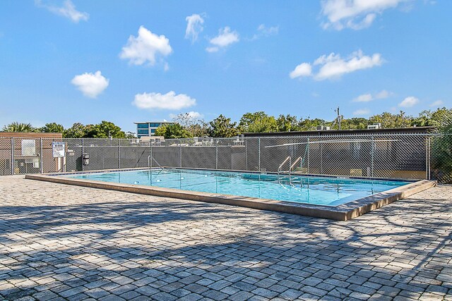 402 Marshall Ct Unit 01, Fort Walton Beach, FL 32548 - community pool featuring a patio area