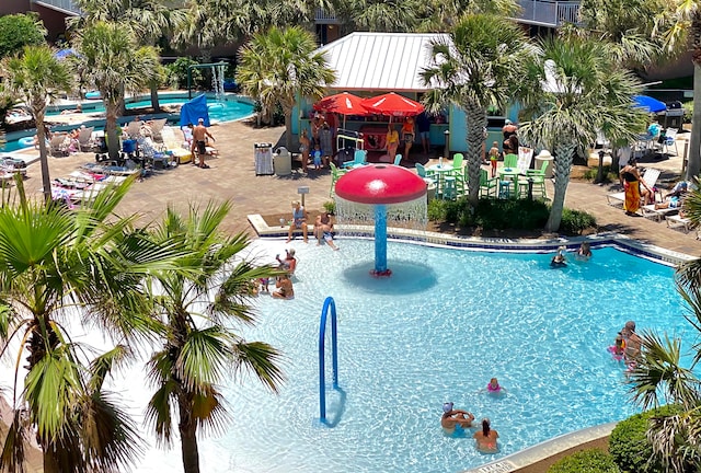 view of pool featuring a patio