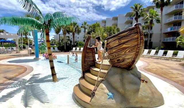 community pool featuring a patio