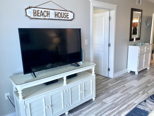 detailed view of wood finished floors and baseboards