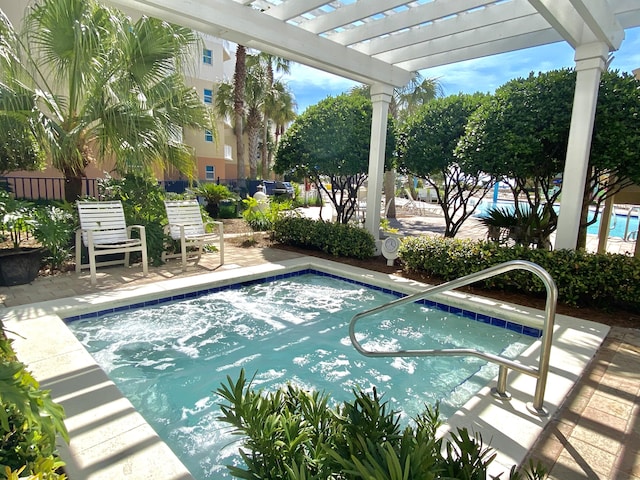 view of pool with a pergola and a community hot tub