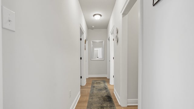 hallway featuring light hardwood / wood-style floors