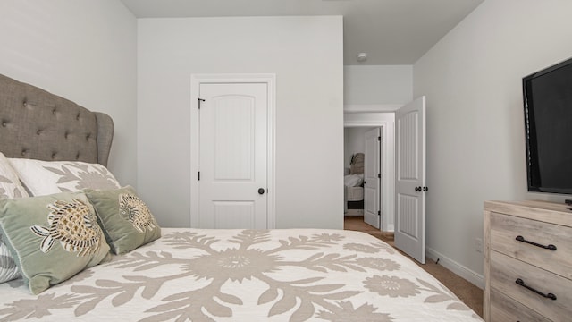 bedroom featuring carpet floors and a closet