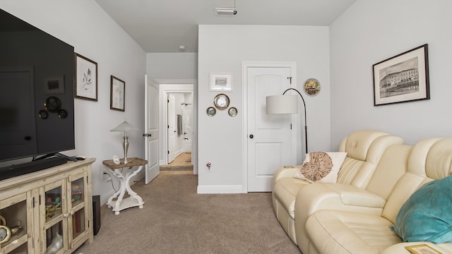 living area with carpet flooring