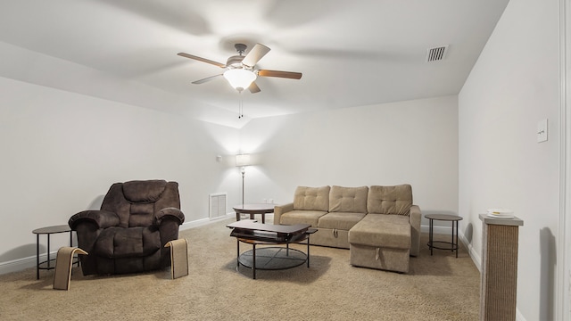 living room with carpet floors and ceiling fan