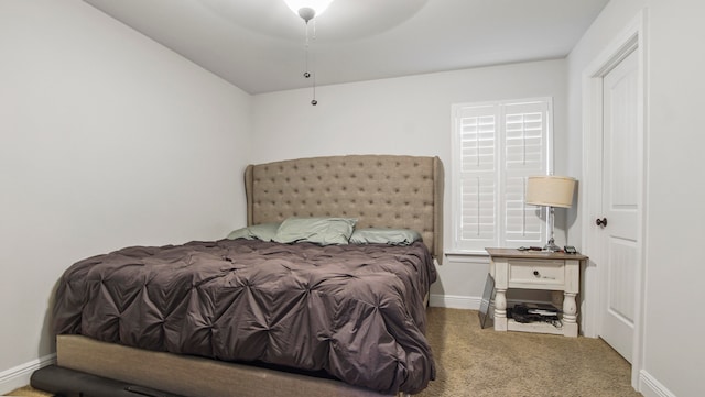 bedroom with carpet flooring and ceiling fan