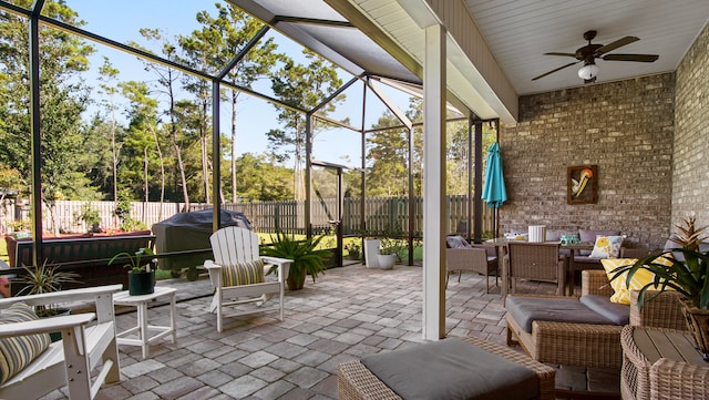 exterior space featuring ceiling fan