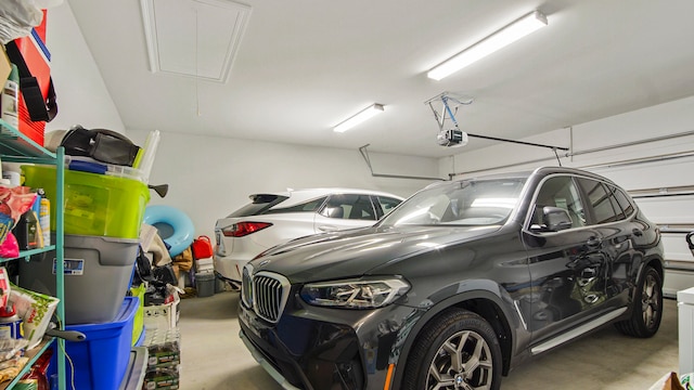 garage featuring a garage door opener