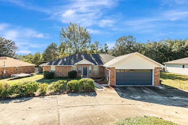 single story home featuring a front lawn and a garage