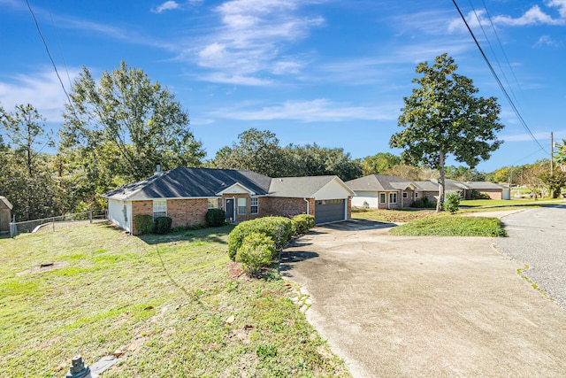 single story home with a garage and a front lawn