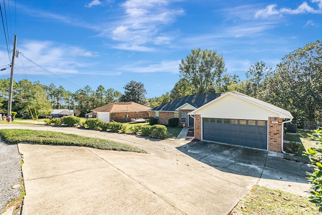 single story home featuring a garage