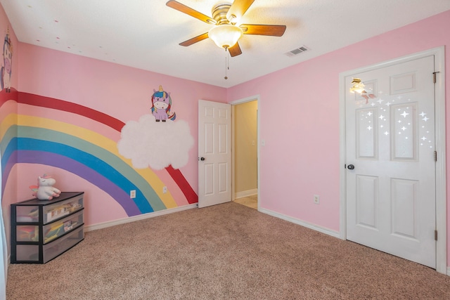 unfurnished bedroom with carpet flooring and ceiling fan