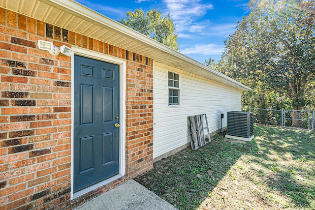 entrance to property featuring central AC