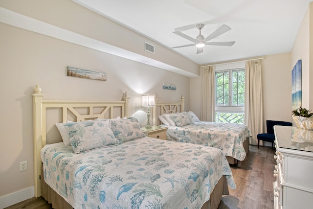 bedroom with hardwood / wood-style floors and ceiling fan