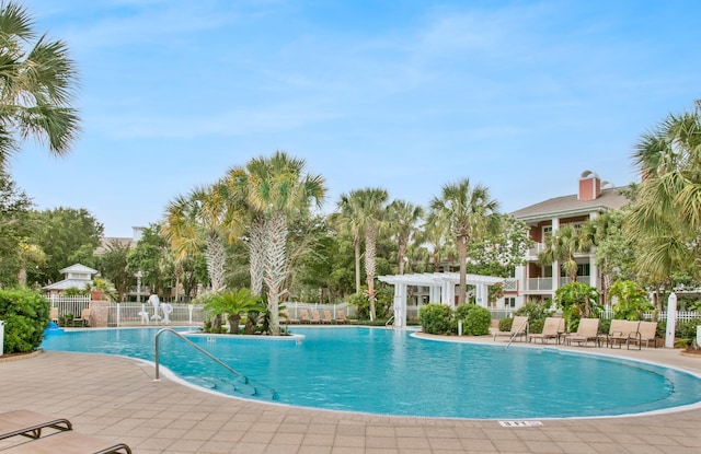 view of swimming pool featuring a patio area