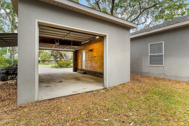 exterior space with a carport