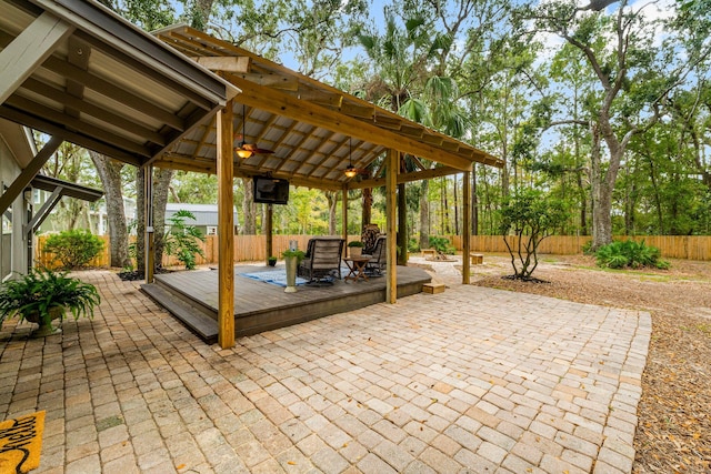 view of patio with a gazebo, ceiling fan, and a wooden deck