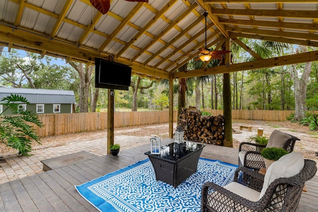 deck with a gazebo and ceiling fan