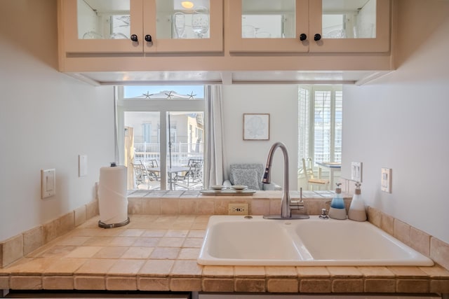 bathroom featuring a bath and sink