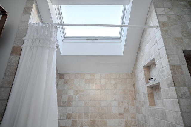 bathroom with curtained shower