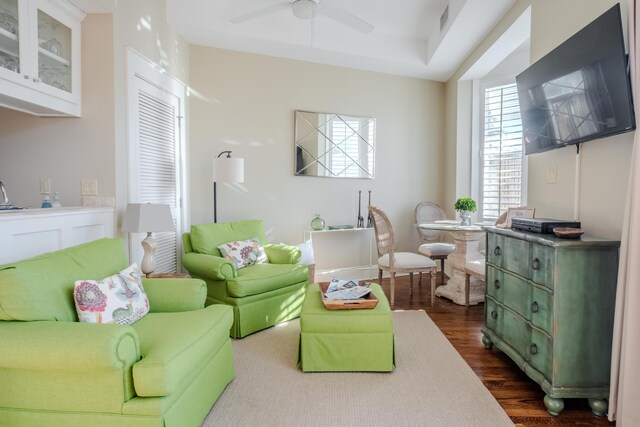 105 Carillon Market St Ste 302, Panama City Beach, FL 32413 - living room with dark wood finished floors and a ceiling fan