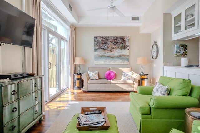 105 Carillon Market St Ste 302, Panama City Beach, FL 32413 - living area featuring dark wood-type flooring and ceiling fan