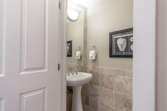 105 Carillon Market St Ste 302, Panama City Beach, FL 32413 - half bathroom with tile walls