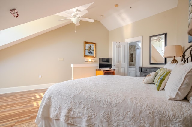 bedroom featuring ceiling fan, wood-type flooring, and lofted ceiling