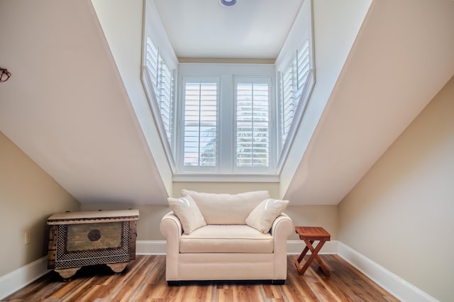 living area with light hardwood / wood-style flooring