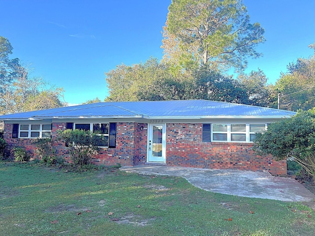 single story home featuring a patio area and a front yard