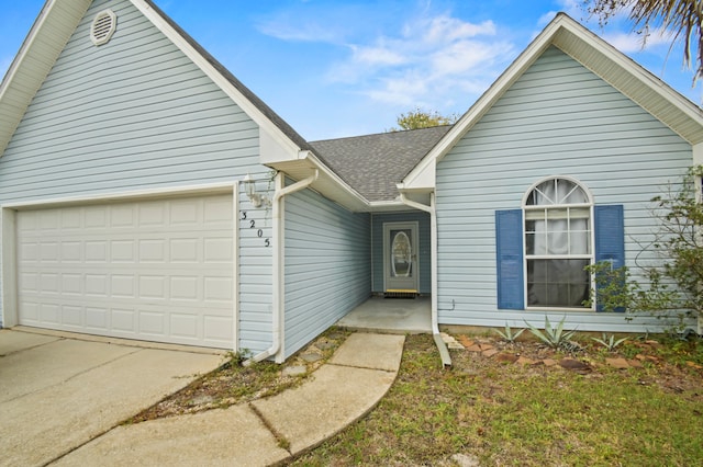 view of front of house with a garage